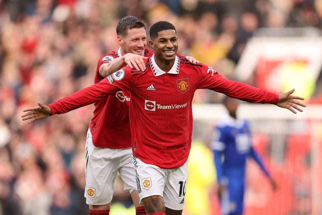 Marcus Rashford of Manchester United celebrates after scoring the team's second goal with teammate Wout Weghorst during the Premier League match between Manchester United and Leicester City at Old Trafford on February 19, 2023 in Manchester, England.