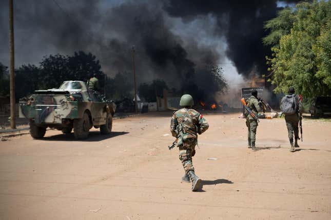 Malian soldiers, working with French forces, battle radical Islamic rebels in Gao, Mali. February 2013.