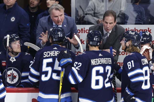 Mar 6, 2023; Winnipeg, Manitoba, CAN; Winnipeg Jets head coach Rick Bowness and assistant coach Scott Ariel discuss a play during a third period time out against the San Jose Sharks at Canada Life Centre.