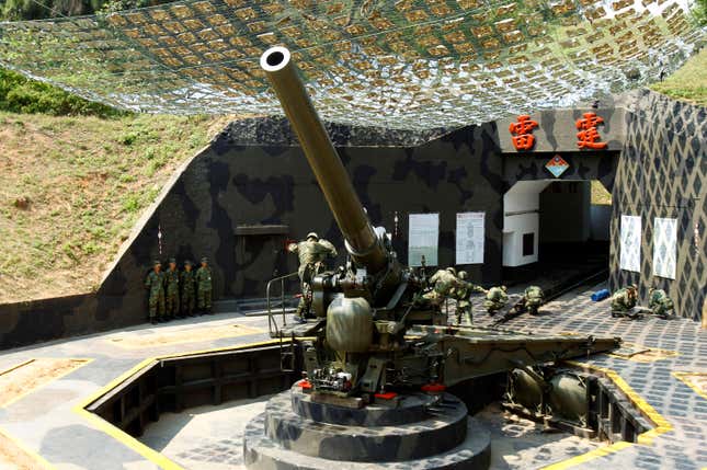 Taiwanese military soldiers load up a 240 mm Howitzer gun during an exercise on the eve of the 53rd anniversary of a massive bombing campaign on Taiwan's Kinmen island, Monday, Aug. 22, 2011. The Communist government forces on mainland China on August 23, 1958, resumed a massive artillery bombardment on Taiwan's outlying islands of Kinmen (formerly Quemoy) and Matsu, and threatened invasion, the event widely known as the 1958 Taiwan Strait Crisis, which continued until October.