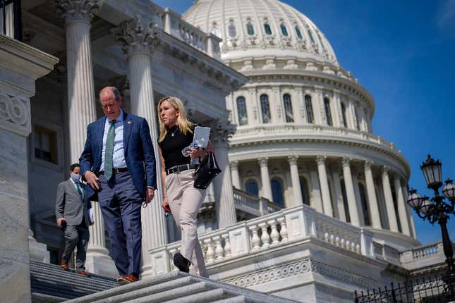 Rep. Dan Bishop (R-N.C.) talks with Rep. Marjorie Taylor Greene (R-Ga.) on the House steps at the U.S. Capitol on March 11, 2021 in Washington, D.C. 