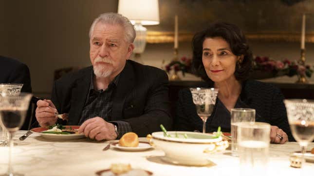 Brian Cox and Hiam Abbass sitting at a dinner table in Succession