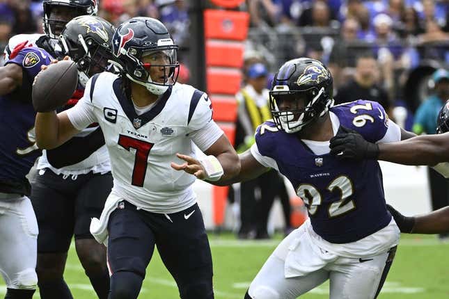 Sep 10, 2023; Baltimore, Maryland, USA; Houston Texans quarterback C.J. Stroud (7) attempts a pass as Baltimore Ravens defensive tackle Rayshad Nichols (91) rushes during the second half at M&amp;amp;T Bank Stadium.
