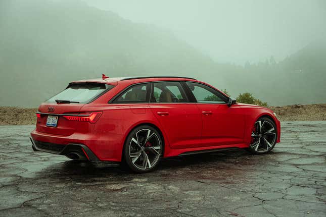 The rear-three-quarter view of the 2022 Audi RS 6 Avant in red