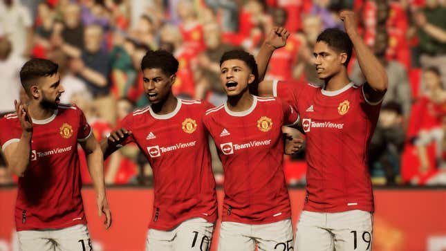 An image from eFootball 2022 of four players possibly celebrating a goal or a victory.