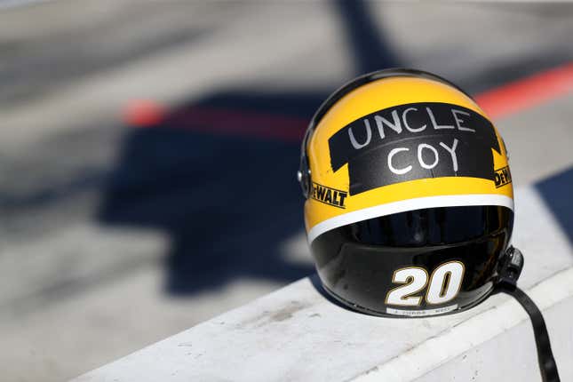 A detail view of a pit crew helmet with “Uncle Coy” written on tape in memory of Coy Gibbs, co-owner of Joe Gibbs Racing during the NASCAR Cup Series Championship at Phoenix Raceway on November 06, 2022 in Avondale, Arizona.