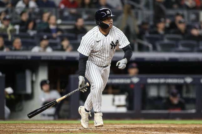 May 2, 2023; Bronx, New York, USA;  New York Yankees designated hitter Willie Calhoun (24) hits a home run in the seventh inning against the Cleveland Guardians at Yankee Stadium.