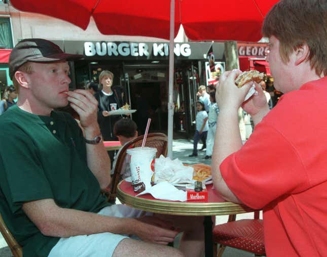 Tourists at a Paris Burger King in 1997, the year the franchise left France.