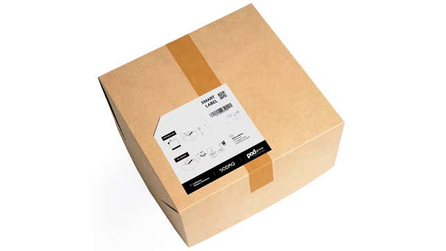 The Pod Group's ultra-thin Smart Label tracker attached to a cardboard box against a white background.