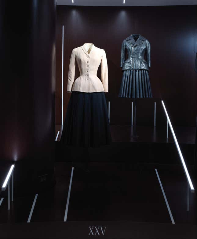 Left: “Bar” Suit, Christian Dior, spring/summer 1947; right, leather jacket and skirt, Junya Watanabe, fall/winter 2011