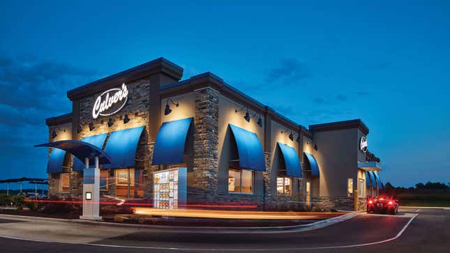 A photo of a Culver's restaurant at night. 