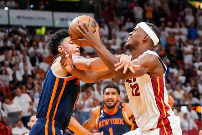 May 6, 2023; Miami, Florida, USA; New York Knicks guard Quentin Grimes (6) fouls Miami Heat forward Jimmy Butler (22) during the second half of game three of the 2023 NBA playoffs at Kaseya Center.