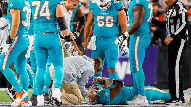 Miami Dolphins quarterback Tua Tagovailoa is attended by medical staff after being sacked by Cincinnati Bengals defensive tackle Josh Tupou on Thursday, Sept. 29, 2022, in Cincinnati, 