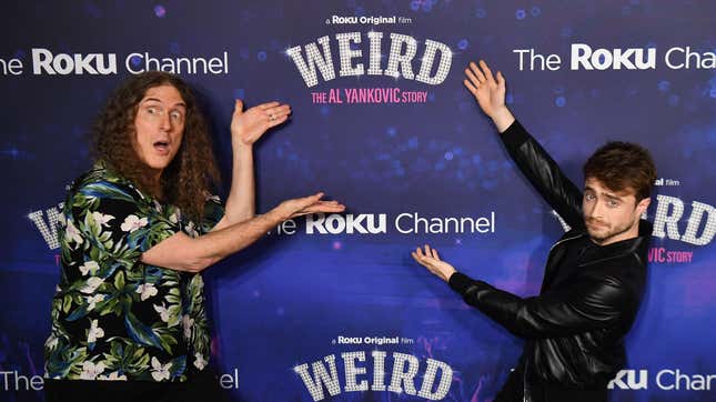 US singer and actor "Weird Al" Yankovic (L) and English actor Daniel Radcliffe arrive for the premiere of "Weird: The Al Yankovic Story" at the Alamo Drafthouse Cinema in Brooklyn, New York on November 1, 2022. (Photo by ANGELA WEISS / AFP) (Photo by ANGELA WEISS/AFP via Getty Images)