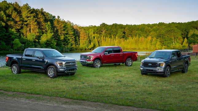 Three 2021 Ford F-150 pickup trucks.