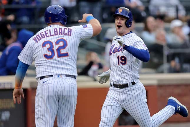 May 1, 2023; New York City, New York, USA; New York Mets left fielder Mark Canha (19) and designated hitter Daniel Vogelbach (32) react after scoring against the Atlanta Braves on a double by catcher Francisco Alvarez (not pictured) during the sixth inning at Citi Field.