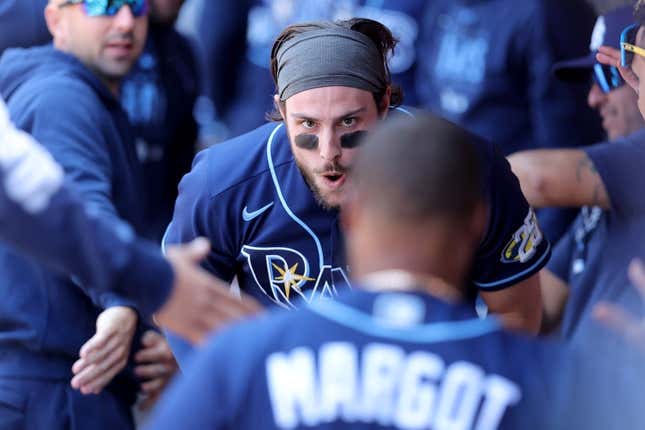 May 18, 2023; New York City, New York, USA; Tampa Bay Rays right fielder Josh Lowe (15) celebrates in the dugout with teammates after hitting a solo home run against the New York Mets during the sixth inning at Citi Field.