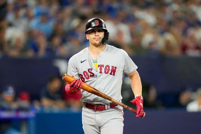 Jul 2, 2023; Toronto, Ontario, CAN; Boston Red Sox shortstop Enrique Hernandez (5) reacts to a striking out against the Toronto Blue Jays at Rogers Centre.