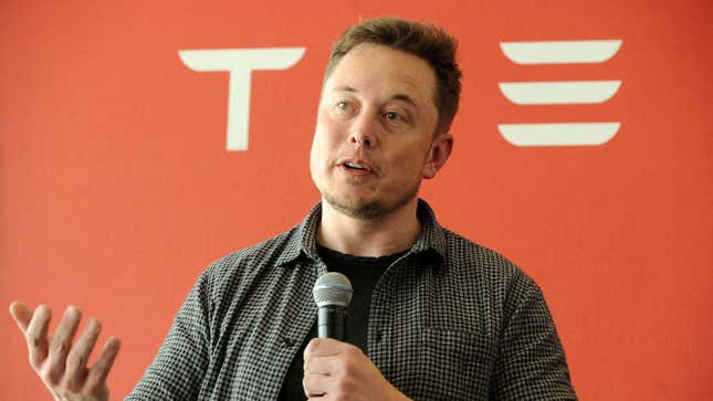 Tesla CEO Elon Musk speaking at an event