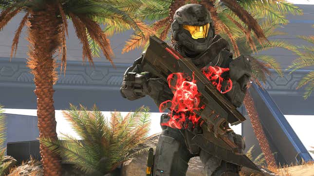 A spartan holds a ravager on the Behemoth map in Halo Infinite.