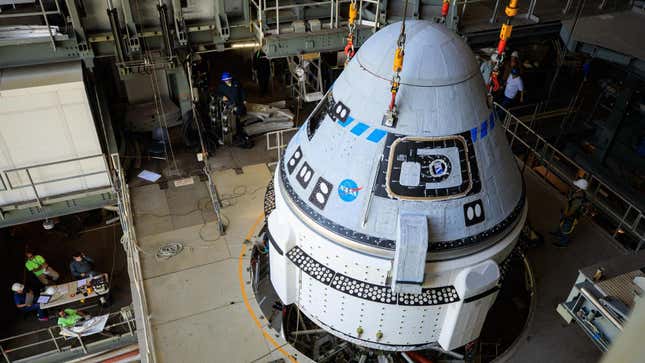 The Boeing CST-100 Starliner being lifted at the Vertical Integration Facility at Space Launch Complex-41 at Cape Canaveral Space Force Station in Florida.