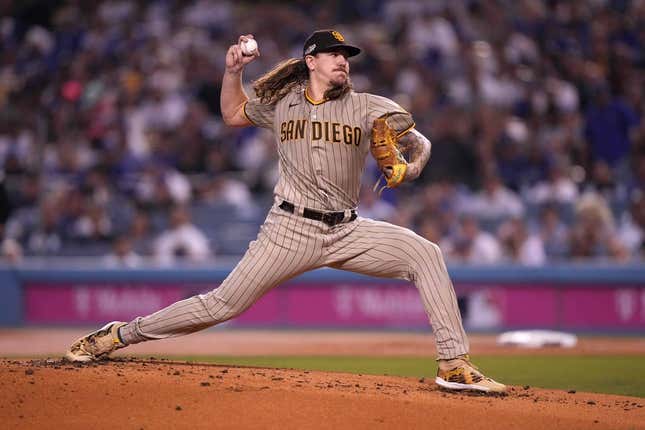 Oct 11, 2022; Los Angeles, California, USA; San Diego Padres pitcher Mike Clevinger (52) throws in the first inning of game one of the NLDS for the 2022 MLB Playoffs against the Los Angeles Dodgers at Dodger Stadium.