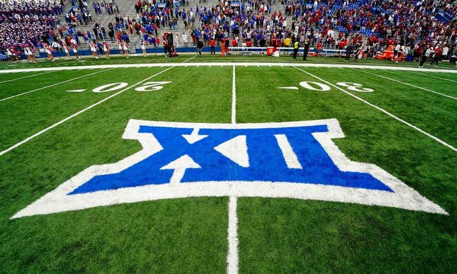 Oct 23, 2021; Lawrence, Kansas, USA; A general view of the Big 12 Conference logo on the field after the game between the Kansas Jayhawks and the Oklahoma Sooners at David Booth Kansas Memorial Stadium.