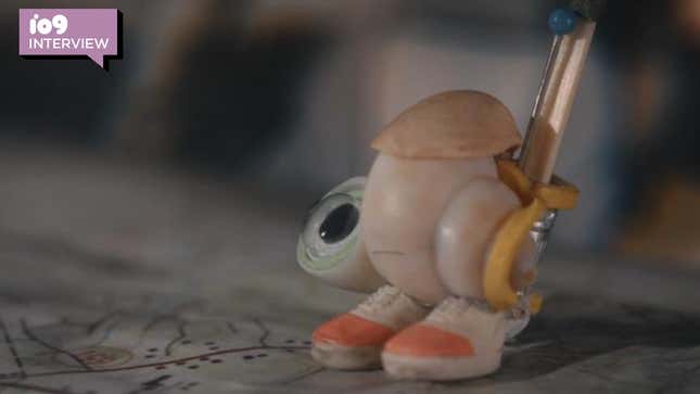 Marcel, a shell with shoes on, carrying a backpack.