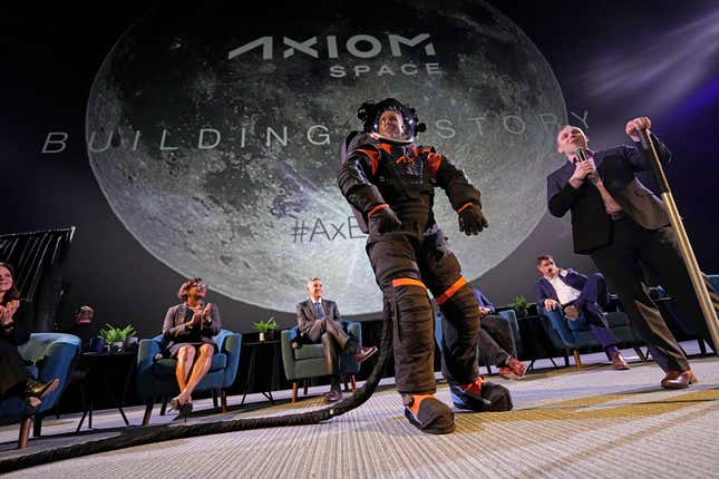 Axiom Space chief engineer Jim Stein demonstrating a prototype Moon suit, March 15, 2023.