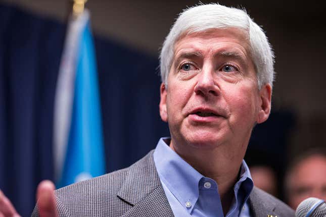 Michigan Gov. Rick Snyder speaks to the media regarding the status of the Flint water crisis on January 27, 2016, at Flint City Hall in Flint, Michigan. 