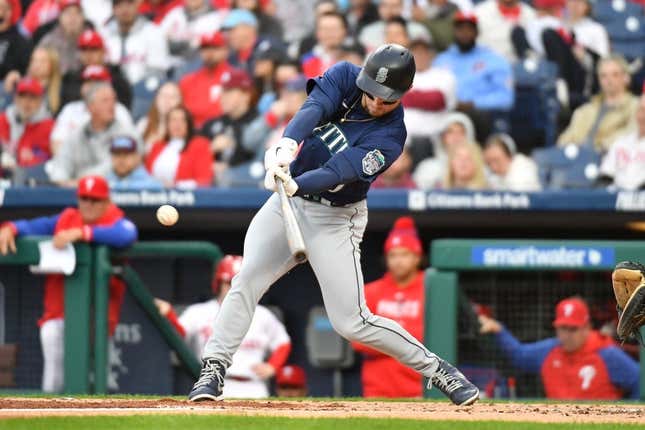 Apr 25, 2023; Philadelphia, Pennsylvania, USA; Seattle Mariners left fielder Jarred Kelenic (10) hits a double during the second inning against the Philadelphia Phillies at Citizens Bank Park.