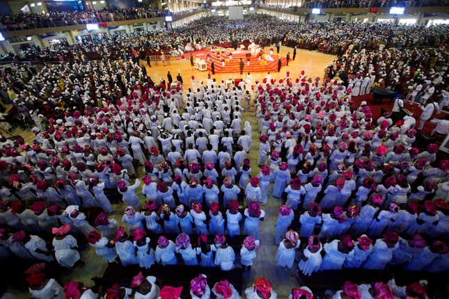 Worshippers attend a church service at the Living Faith Church, also known as the Winners’ Chapel just outside Lagos
