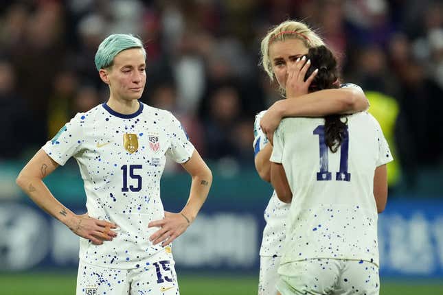Lindsey Horan hugs Sophia Smith as Megan Rapinoe watches, after loosing during the penalty kick shootout during the FIFA Women’s World Cup.