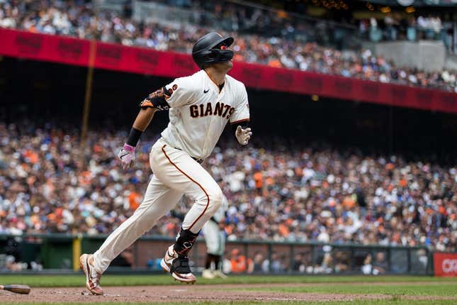 Jun 11, 2023; San Francisco, California, USA;  San Francisco Giants catcher Blake Sabol (2) hits an RBI single against the Chicago Cubs during the fourth inning at Oracle Park.