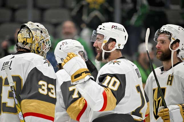 May 23, 2023; Dallas, Texas, USA; Vegas Golden Knights goaltender Adin Hill (33) and center Nicolas Roy (10) celebrate on the ice after the victory over the Dallas Stars in game three of the Western Conference Finals of the 2023 Stanley Cup Playoffs at American Airlines Center.