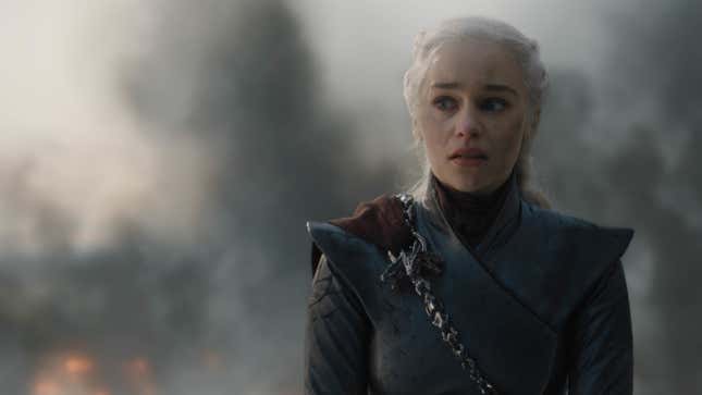 Smoke and fire rising behind her, Emilia Clarke's Daenerys looks utterly bewildered at her own destruction of King's Landing.