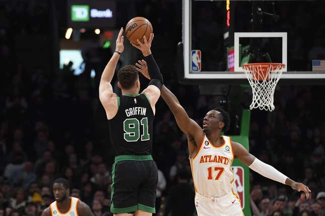 Apr 9, 2023; Boston, Massachusetts, USA; Boston Celtics forward Blake Griffin (91) shoots the ball over Atlanta Hawks forward Onyeka Okongwu (17) during the first half at TD Garden.
