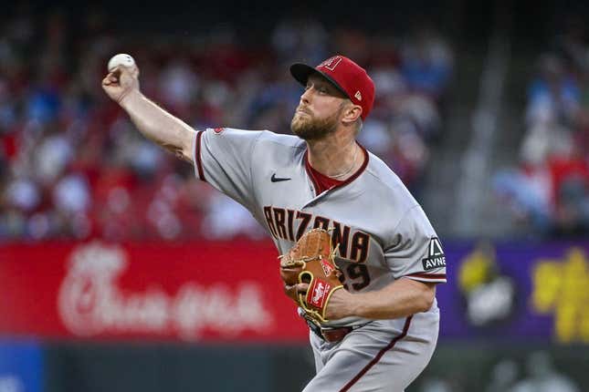 Apr 17, 2023; St. Louis, Missouri, USA;  Arizona Diamondbacks starting pitcher Merrill Kelly (29) pitches against the St. Louis Cardinals during the second inning at Busch Stadium.