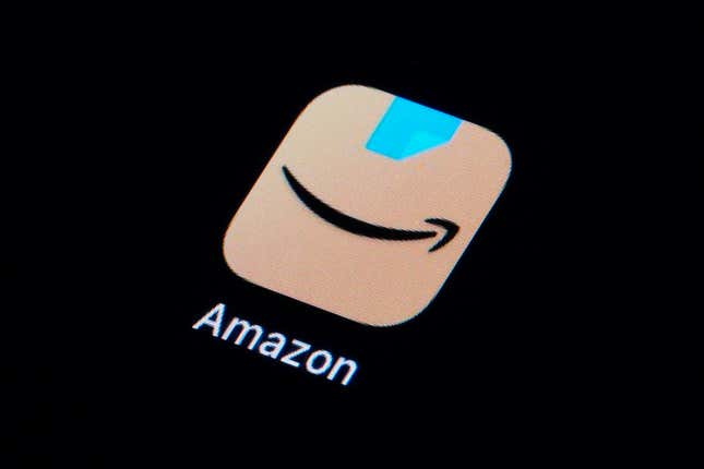 FILE - The Amazon app is seen on a smartphone, Tuesday, Feb. 28, 2023, in Marple Township, Pa. After months of complaints from the Authors Guild and other groups, Amazon.com started requiring writers who want to sell books through its e-book program to tell the company in advance that their work includes artificial intelligence material. (AP Photo/Matt Slocum, File)