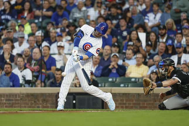 Aug 15, 2023; Chicago, Illinois, USA; Chicago Cubs left fielder Ian Happ (8) hits a two-run home run against the Chicago White Sox during the first inning at Wrigley Field.