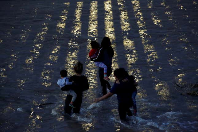 Migrants from Central America cross the Rio Bravo river to enter illegally into the United States to turn themselves in to request asylum in El Paso, Texas, US. June 11.