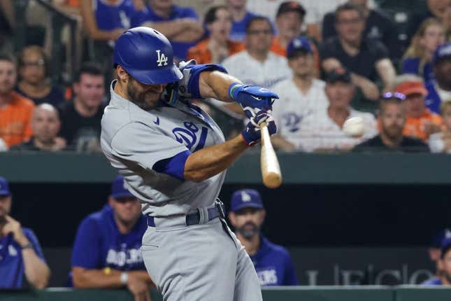 Jul 17, 2023; Baltimore, Maryland, USA;  Los Angeles Dodgers shortstop Chris Taylor (3) hits a sixth inning grand slam against the Baltimore Orioles at Oriole Park at Camden Yards.