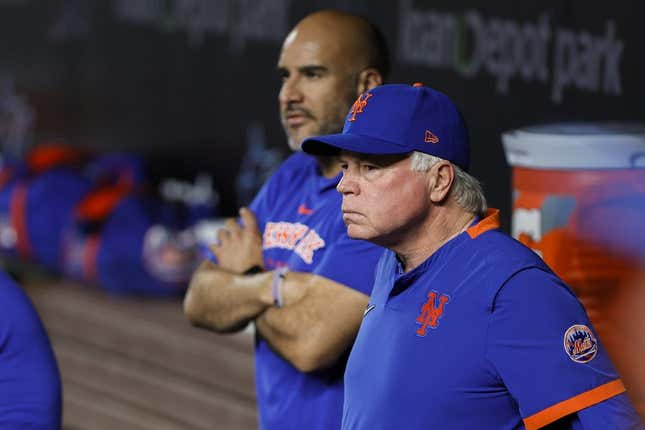 Mar 30, 2023; Miami, Florida, USA; New York Mets manager Buck Showalter (11) looks on from inside the dugout prior to the game against the Miami Marlins at loanDepot Park.