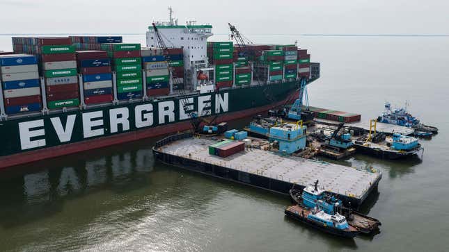 A photo of cranes unloading containers from the Ever Forward ship.