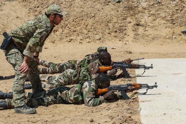 A U.S. Army Special Forces weapons sergeant observes a Niger Army soldier during marksmanship training as part of Exercise Flintlock 2017 in Diffa, Niger, Feb. 28, 2017. Niger was one of seven locations to host tactical-level training during the exercise while staff officers tested their planning abilities at a simulated multinational headquarters in N’Djamena, Chad.