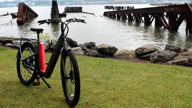 A photo of the NIU e-bike near the Hudson river. 