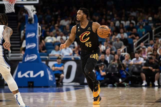 Apr 4, 2023; Orlando, Florida, USA; Cleveland Cavaliers guard Donovan Mitchell looks to pass against the Orlando Magic at Amway Center.