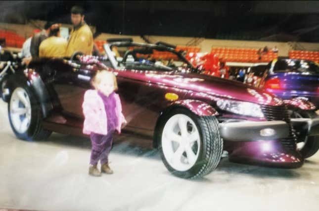 Baby Beth, matching her purple velour tracksuit to a Prowler.