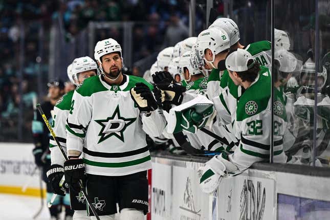 Mar 13, 2023; Seattle, Washington, USA; Dallas Stars left wing Jamie Benn (14) celebrates with the bench after scoring a goal against the Seattle Kraken during the first period at Climate Pledge Arena.