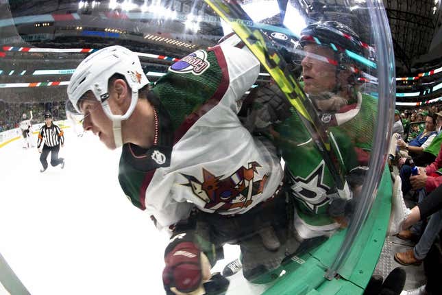 Mar 1, 2023; Dallas, Texas, USA; Arizona Coyotes defenseman Victor Soderstrom (77) and Dallas Stars center Ty Dellandrea (10) chase the puck during the second period at the American Airlines Center.